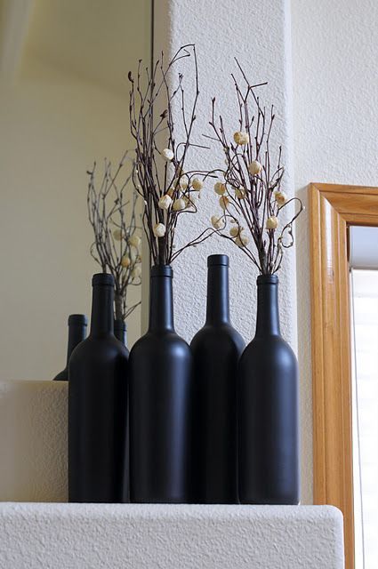 What to do with empty wine bottles? These are covered in chalk board paint Wedding Centerpieces Wine Bottles, Wine Bottles Diy, Wine Bottle Upcycle, Diy Chalkboard Paint, Repurposed Wine Bottles, Bottles Diy, Wine Bottle Vases, Wine Bottle Centerpieces, Old Wine Bottles