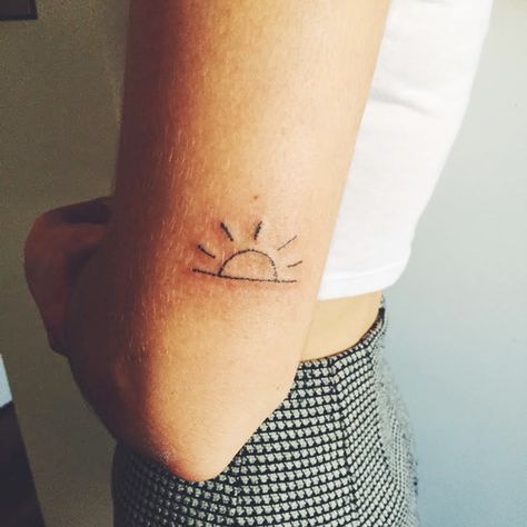 Stick-and-poke tattoos are having a major moment. They made their way onto Instagram feeds last year: photos of tiny, puzzled Bart Simpsons above anklebones or delicate, pointillist planets orbiting spinal curves. Style.com proclaimed them the coolest tattoo style of 2015.  These tattoos are Best Tatto, Sunrise Tattoo, Tattoo Sonne, Stick Tattoo, Stick Poke Tattoo, Stick N Poke, Muster Tattoos, Stick N Poke Tattoo, Sun Tattoos