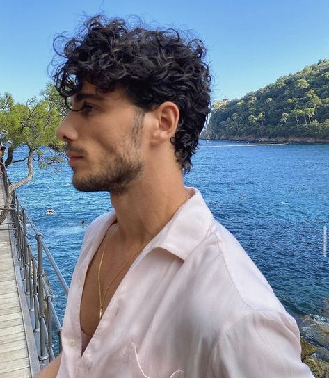 Man in white button down shirt with curly hair near the ocean and moutains! #curlyhair #curlyhairmen #menwithcurls #menwithcurlyhair #curlyhairguys #curlyhairforguys #curlyhaircutmens Haircuts Thick Curly Hair, Spanish Hairstyles, Undercut Curly Hair, Medium Curly Haircuts, Long Curly Hair Men, Men's Curly Hairstyles, Mens Hairstyles Curly, Male Haircuts Curly, Men Haircut Curly Hair