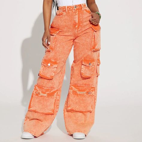 Product Details Available In Orange. Wide Leg Cargo Jean Non Stretch Denim Loose Fit All Over Cargo Pockets 34" Inseam 12" High Rise Disclaimer: Due To The Specialized Wash Process, Each Garment Is Unique. 100% Cotton Imported Orange Cargo Pants Outfit, Orange Streetwear, Pink Lifestyle, Cargo Pants Outfit, Service Women, Orange Shirt, Cute Jeans, Cargo Jeans, Fashion Nova Jeans