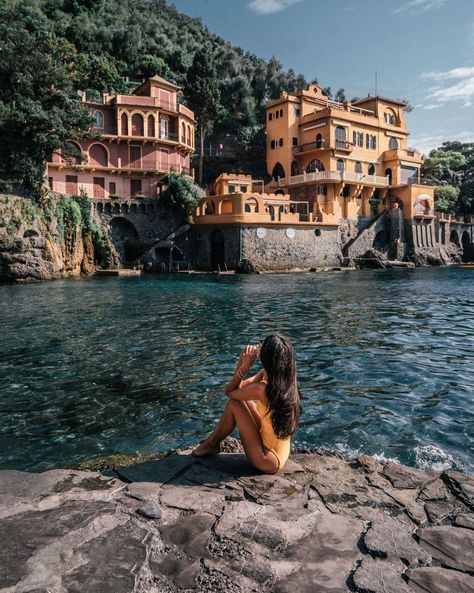 Portofino's iconic golden villa sits perched on Cannone Bay. From the main road in front of Hotel Piccolo, there are steps that lead down to the tiny, quiet cove where visitors will find a small patch of rocky beach, as well as coastal rocks for sunbathing. The water is calm, and the dazzling Ligurian villas are close enough for a swim. Cannone Bay is a five-minute walk from the main part of town. #italy #portofino Cinque Terre, Swimming In Italy, Italy Beach Aesthetic, Portofino Beach, Italy Portofino, Ligurian Coast, Instagram Italy, Italy Vibes, Italy Beaches