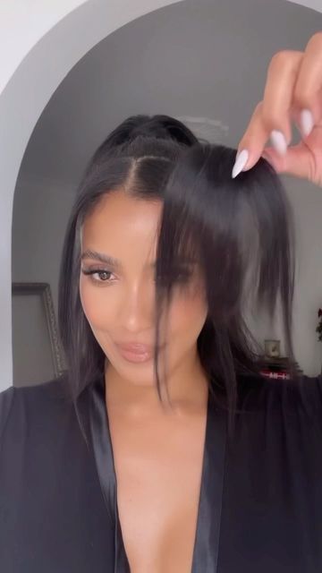 Julissa Bermudez on Instagram: "I won’t cut bangs, but I’ll clip them in 💁���🏽‍♀️😆 Found this bang hair piece on Amazon (search: NAYOO bang clip in bang) the color I’m wearing is natural black Tancho pomade stick (Amazon) @tresemme Extra hold hairspray number 4 @neurohair Neuro halo titanium flat iron" Fringe Clipped Back Hairstyles, Bangs Clip In, Clip In Bangs Before And After, Julissa Bermudez, Clip On Bangs, Nano Hair Extensions, Clip In Fringe, Faux Bangs, Bangs Extensions