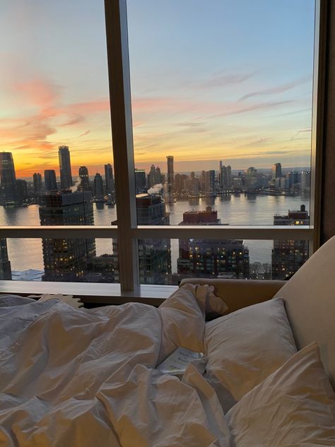 Morning view, bedroom goals, bedroom inspiration, bedroom view, bedroom, sheets, duvet, duvet covers, nyc view, nyc room, sunrise book inspirations, book to read, financial freedom, financial inspiration Dream Apartment Nyc Bedrooms, Apartment Decor Inspiration Aesthetic, White New York Apartment, Nyc In The Morning, High Rise Apartment Nyc, Nyc Morning Aesthetic, Aesthetic Apartment Minimalist, Dream Apartment Aesthetic Minimalist, New Condo Aesthetic