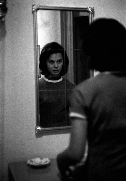 mirror & reflection topic = Giorgia Moll In Front Of A Mirror 1957 Looking Into A Mirror Photography, Eyes In Mirror, Reflection In A Mirror, Reflection In Mirror Photography, Woman Standing In Front Of Mirror, Reflection In The Mirror Drawing, Self Reflection Mirror, Reflection Mirror Art, Looking In Bathroom Mirror Reference