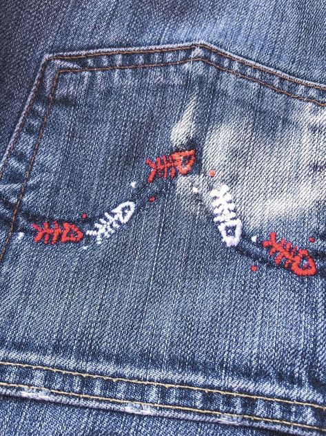 Fishbone idk lol Patched Black Jeans, Fish Skeleton Embroidery, Battle Jacket Embroidery, Punk Embroidery Ideas, Punk Jean Jacket, Punk Embroidery, Goth Embroidery, Skeleton Embroidery, Embroidery Fish