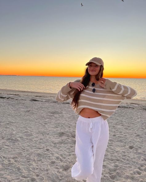 beach outfit, tan striped sweater, white beach pants Sunset Outfits Beach Comfy, Cute Beach Outfits Cold Weather, Beach Cleanup Outfit, 60 Degree Beach Outfit, Fall Beach Bonfire Outfit, Comfy Beach Outfit Winter, Beach Outfits Comfy, Cute Beach Winter Outfits, Beach Outfit Long Sleeve