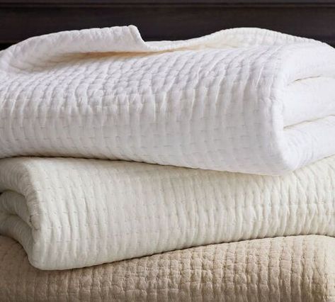 Pick-Stitch Handcrafted Cotton/Linen Quilt from Pottery Barn Here at TLD, we believe that the best beds are the ones with layers. In this post, we discuss how to make a bed like a designer using coverlets. | how to make a bed like a designer | home decor tips and tricks | home decor tips interiors | home decor budget ideas | home decor inspo living room | home decor ideas | how to make a bedroom cozy | how to make a bed like a hotel | Ivory Quilt, White Quilt Bedding, Tiffany Leigh Design, Pottery Barn Quilts, Bedroom Linen, White Coverlet, Pick Stitch, Cotton Clouds, Signature Quilts