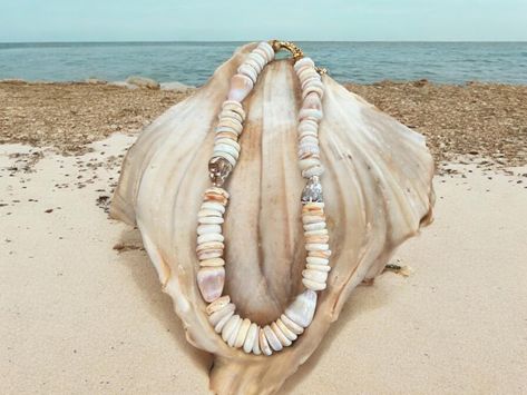 Surf Tumbled Cone Shell & Puka Shell Necklace 🐚 Crafted from ethically and lovingly collected Hawaiian shells in a mix of whites, creams, cinnamons, purples, & peaches. Available in my Of The Sea 🌊 Collection. • • #pukashells #pukashellnecklace #coneshell #shellsofhawaii #handmadejewelry Cone Shell, Puka Shell Necklace, Puka Shell, Necklace Craft, Shell Necklace, Shell Necklaces, Peaches, The Sea, Surfing