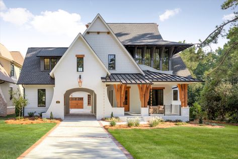 A deep homesite afforded the opportunity to build something truly unique and offer a Porte-Cochere drive through to the courtyard garage area. This home can't be described in one particular style, but we like to refer to it as Modern Dutch European Farmhouse. Modern English Country, Transitional Exterior, Country House Design, Porte Cochere, Property Design, Décor Boho, Custom Built Homes, English Country House, English Cottage