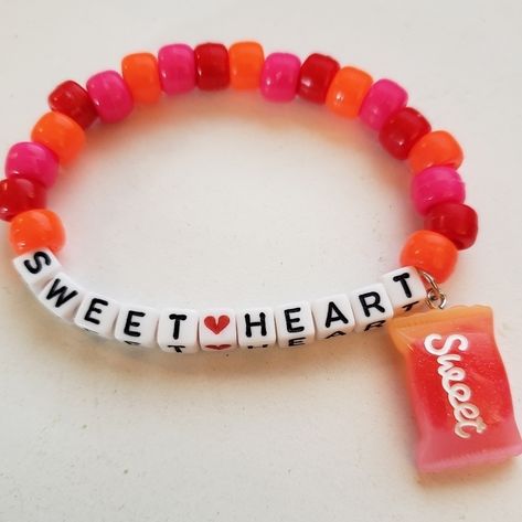 Adorable "Sweetheart" Kandi Word Bracelet Made With Pony Beads, White Letter Beads, Jump Ring, And Sweet Candy Charm. Bracelet Is 30 Beads Around And Made With Elastic String To Adjust To Any Size Wrist. Tags: Edc, Edm, Rave, Festival, Kandi, Plur, Kawaii, Bead Bracelet, Candy Charm Bracelet, Single Kandi Bracelet, Beaded Bracelet, Kandi Bracelet, Rave Bunny, Kandi Charm Bracelet, Kandi Raver, Hippie, Pink, Orange, Red, Glitter Charm Bracelet Festival Kandi, Kawaii Bracelet, Halloween Charm Bracelet, Pony Bead Bracelets, Fork Bracelet, Kandi Cuff, Dragonfly Bracelet, Edm Rave, Healing Gemstone Bracelets