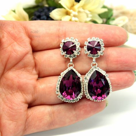 "Amethyst Earrings  Chandelier Earrings Purple Bridal Earrings Wedding Crystal Earrings Vintage Wedding Victorian Jewelry  Premium Quality Statement Earrings in  Amethyst Crystals. This shade of purple is the symbol of elegance, grace and breath-taking beauty! The earrings feature 18x13mm Amethyst  teardrop pear shaped fancy stone and  Amethyst Rivoli stones. The crystals are meticulously handset in Sterling Silver Plated brass settings, embellished with clear crystal rhinestones. Rhodium Plated Wedding Crystal Earrings, Bridesmaid Statement Necklace, Wedding Victorian, Purple Drop Earrings, Blue Crystal Bracelet, Hot Pink Earrings, Swarovski Crystal Drop Earrings, Bridal Statement Earrings, Lavender Earrings