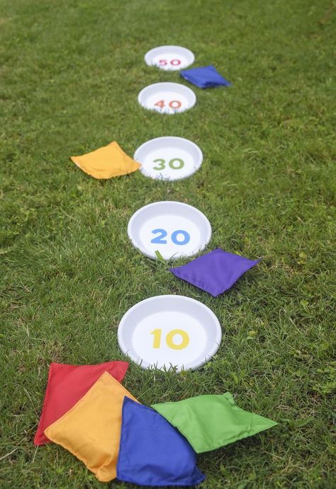How to make a unique bean bag toss game from terra cotta pot saucers and a printable (which you can get for free by clicking through!) Diy Bean Bag, Bean Bag Games, Outdoor Party Games, Outside Games, Fun Outdoor Games, Bean Bag Toss Game, Bag Toss Game, Bean Bag Toss, Bag Toss