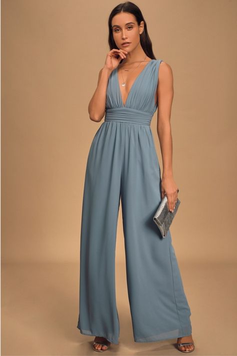 Bring ethereal inspiration to every occasion with the Lulus Divine Muse Slate Blue Wide-Leg Jumpsuit! Lightweight, woven chiffon shapes this captivating jumpsuit with a sleeveless bodice, wide tank straps, and a plunging V-neckline and back. A pleated, empire waist tops the flowy, wide-leg pants for a flattering finish. Hidden back zipper/clasp. Fit: This garment fits true to size. Length: Floor length. Size medium measures 60" from shoulder to hem. Inseam: 32.50 Front Rise: 14.50 Bust: Great fo Jumpsuit Wedding Guest, Elegante Jumpsuits, Bridesmaids Jumpsuits, Jumpsuit For Wedding Guest, Empire Waist Tops, Chique Outfits, Rompers Dressy, Blue Jumpsuit, Wedding Jumpsuit