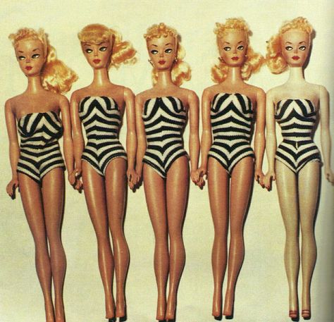 One-of-a-kind, pre-patent prototype 1958 #1 Barbie dolls. The 4 dolls on the left are prototypes molded out of a higher quality vinyl that doesn't fade like the vinyl used for production 1959 #1 Barbies. Note the fading on the production doll on the far right end. The prototypes each have uique hand-painted faces, reminiscent of the 1955 German Bild Lilli doll Mattel's design engineer, Jack Ryan, used as the model for the doll Ruth Handler wanted her company, Mattel, to create and manufacture. Weird Fish, Barbie Doll House, Barbie Vintage, Barbie I, Vintage Barbie Dolls, Barbie Friends, Barbie Collection, Barbie And Ken, Barbie World