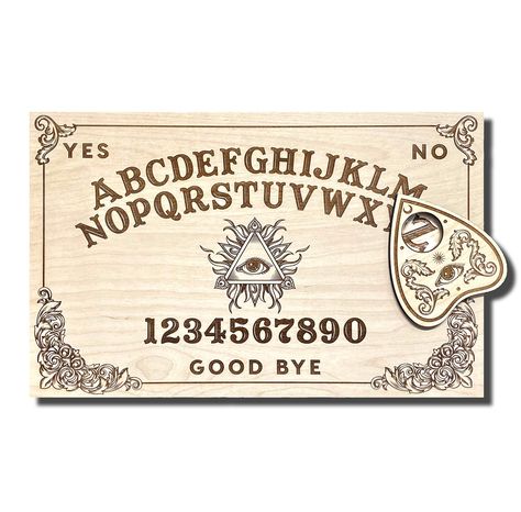 PRICES MAY VARY. This distinctive spirit board is a classic tool to communicate with spirits. It has been a way of communicating with spirits since the 1800's. Each board accompanies a wooden planchette that easily maneuvers while connecting with the dead. Its unique design is a must have for any collector or metaphysical believer. The size of the board is 18 x 11.4'' and 3/8ths thickness. Made out of solid 3/8'' premium quality birch wood. This natural birch wood is finely sanded for a smooth f Witchcraft Altar, Wiccan Altar, Spirit Board, Seeing Eye, Divination Tools, All Seeing Eye, All Seeing, Eye Design, Magnifying Glass