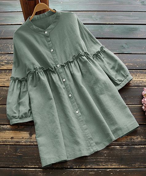 Sage Green Ruffle Button-Up Empire-Waist Top - Women. A little romance goes a long way in this feminine empire-waist top featuring ruffle accents and lantern-like sleeves that create a soft and flowy fit you can pair with jeans or leggings. Size S: 26.4'' long from high point of shoulder to hemWoven70% cotton / 30% polyesterHand washImported Nautical Chic, Striped Off Shoulder Top, Empire Waist Tops, Stylish Jackets, Womens Plus Size, Stylish Tops, Clothing Hacks, Off Shoulder Tops, Casual Top
