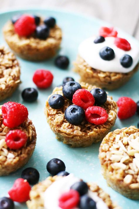 Baked oatmeal cups: Baked oatmeal, but more fun. Make-ahead and customizable with a variety of toppings. Domestic Geek Recipes, Berry Cups, Breakfast Granola Cups, Geek Recipes, Berry Granola, Granola Cups, Make Ahead Brunch Recipes, Breakfast Granola, Domestic Geek