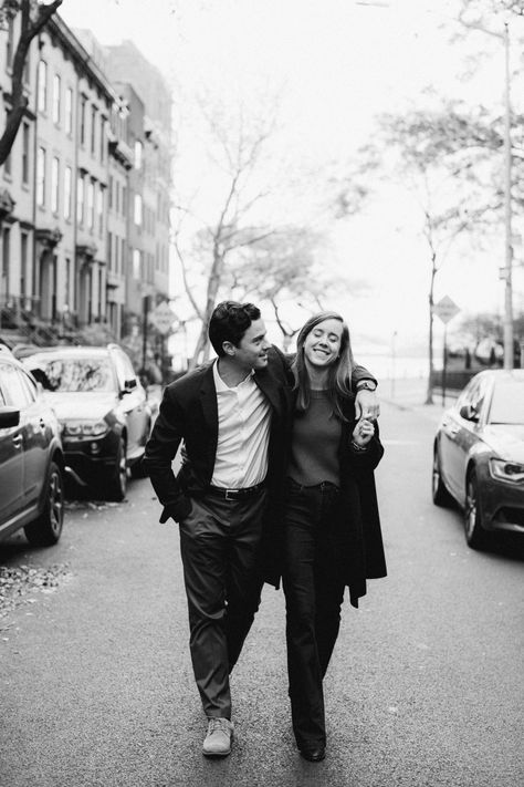 Black and white portrait of couple walking down street Walking Down Street Aesthetic, Couple Walking Pose Reference, Couple Walking Photography, Couples Walking Together Street, Couple Walking Reference, Couple Walking Together Aesthetic, Couples Walking Together, Star Wars Engagement Photos, Disco Couple