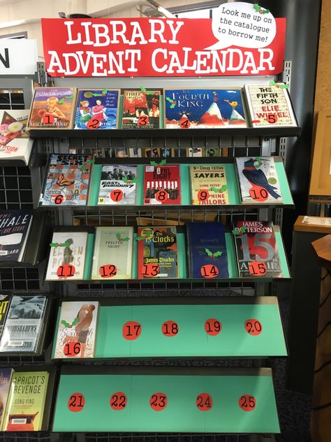 It's the library advent calendar! Each book displayed has a number from 1-25 in the title, with a new title added each day until Christmas #librarydisplay Library Christmas Activities, Library Book Displays December, Library Advent Calendar, Holiday Book Display Ideas, Christmas Display Library, Winter Library Programs For Adults, Library Displays Christmas, Winter Reading Programs For Libraries, Christmas Library Activities