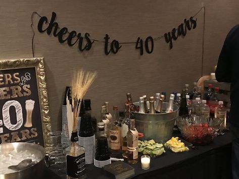 Bar setup for Birthday party Table Bar Setup, Party Bar Setup Ideas, Birthday Table Setup For Men, 30th Birthday Dinner Party Ideas For Men, Bar Area For Party, Birthday Bar Setup, Home Bar Party Set Up, Mens Birthday Dinner Decor, Bar Table Set Up For Party