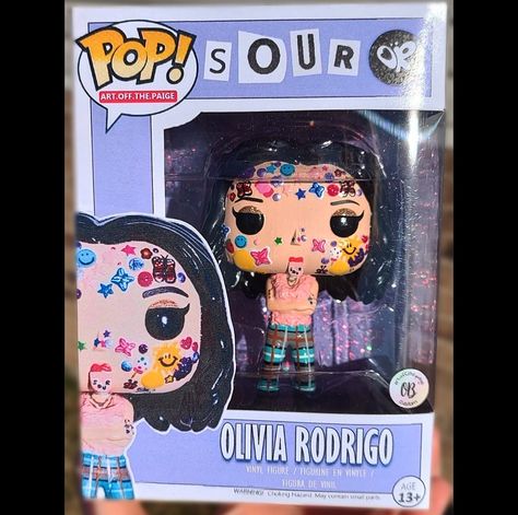 Custom Olivia Rodrigo Sour Pop! 💜🍓 . DM me for all inquiries! . #olivia #oliviarodrigo #sour #dejavu #good4u #driverslicense #brutal #strawberry #strawberryicecream #icecream #sweet #malibu #or #hsm #taylorswift #funkopop #pop #custom #purple #star #smile #heart #sun #butterfly #sparkle #gift #concert #music Funko Pop Custom, Sticker Overlay, Игрушки Funko Pop, Liv Rodrigo, Funko Pop Display, Olivia Lyrics, Olivia + Core + Aesthetic, Guts Tour, Zestaw Ikon