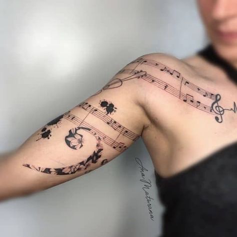 Music Notes Tattoo Sleeve, Musical Staff Tattoo, Music Tattoo Notes, Music Arm Sleeve Tattoos, Staff Music Tattoo, Forearm Music Tattoo, Musical Tattoo Sleeve, Music Back Tattoos For Women, Music Back Tattoo