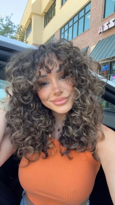 Layered Haircuts for Curly Hair Blonde Highlights Brown Curly Hair, Curly Ombre Hair Naturally, Low Light Curly Hair, Whisky Bangs Curly Hair, Curly Haircut And Color, Curl Haircuts For Women, Messy Curly Short Hair, Ash Brown Curly Hair Natural Curls, Perm Hair With Bangs