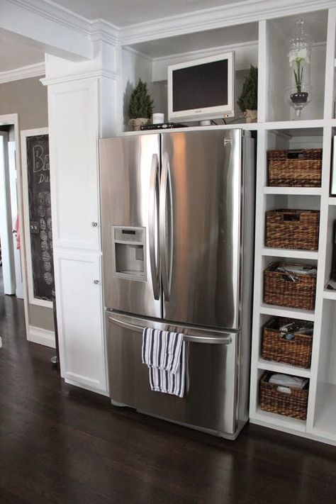 You could stash a folding step stool in the space, or you could try one of these more inventive ideas. Kitchen Built Ins, Kitchen Built In, Refrigerator Cabinet, Tv In Kitchen, Kitchen Fridges, Built In Refrigerator, Kitchen Refrigerator, Small Space Kitchen, Built In Cabinets