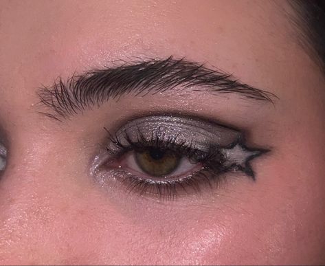 Black Eyeliner And Eyeshadow, Simple Black And Silver Eyeshadow, Black And Silver Star Makeup, Black Grey Eye Makeup, Star Makeup Hooded Eyes, Smokey Black And Silver Eye Makeup, Star Eyeshadow Makeup, Rockstar Gf Eye Makeup, Star Eyeliner Stamp Looks