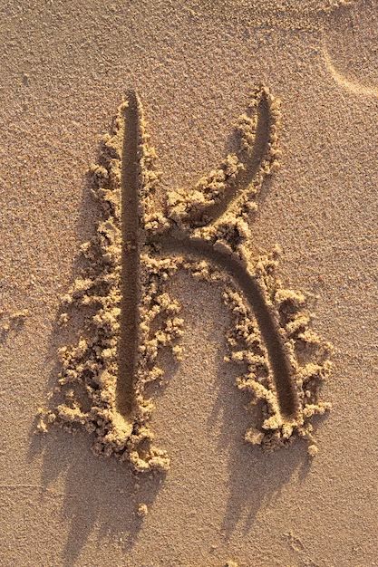 Premium Photo | Alphabet (k) letters handwritten in sand on beach K Letter Images, Letters Handwritten, Small Letter Tattoo, Bubble Letter Fonts, Letter Fonts, Drawings For Boyfriend, Letter Ideas, Sensory Art, Aesthetic Letters