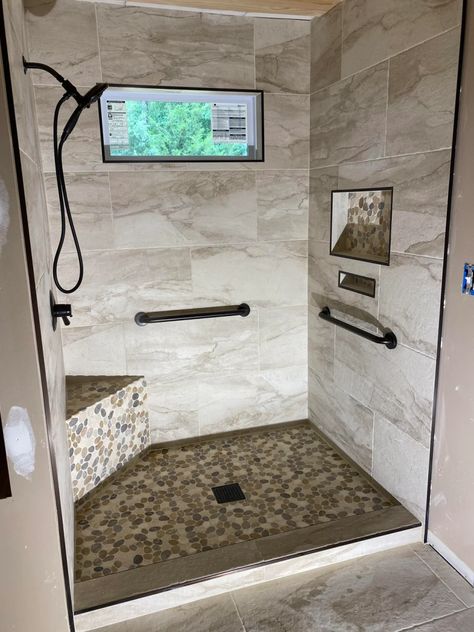 The bathroom is the one place where we feel most in touch with ourselves. Let your bathroom speak of your personality by creating a spa-like design that you and your loved ones will enjoy. Feel free to use one of these 17 stunning walk-in showers with bench ideas to achieve this and transform your safe space. His And Her Walk In Shower Ideas, 3x5 Shower Design With Bench, Walk In Shower With Bench Ideas, Walk In Shower No Door Small Bathroom, Guest Bathroom Walk In Shower Ideas, Half Wall Shower Walk In, Walk In Shower No Door With Bench, Shower With Corner Seat, Shower Walk In No Door