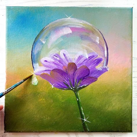 An acrylic painting on canvas with blurry background that looks like a park or garden. There is a purple flower as the main object of the painting, wrapped with beautiful shiny bubble Pastel Nature Art, Blurry Background Painting, Spring Flowers Painting Acrylic, Painting Idea On Canvas, Painting Bubbles, Blurry Background, Acrylic Flower Painting, Bubble Painting, Acrylic Painting Flowers