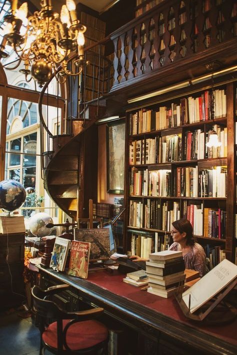 Interesting front counter/bar and stair railing Dream Library, Fantasy Bookstore, Vintage Library Aesthetic, Fantasy Library, Bookstore Ideas, Book Shops, Bookstore Cafe, Library Aesthetic, Beautiful Library