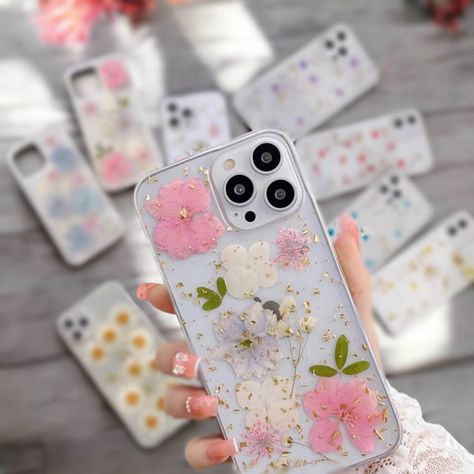 Transform your phone into a botanical masterpiece with our Pressed Flower Phone Case. Crafted for the latest iPhone models, this case showcases the delicate beauty of nature. Each case is a unique work of art, encasing real flowers in a high-quality resin that protects your phone while capturing the elegance of a blooming garden. ----------------------------------------- *✨Features: ✿Material: Premium Resin, Genuine Pressed Flowers ✿Design: Unique Floral Pattern for a One-of-a-Kind Look ✿Compati Nature, Pressed Flower Phone Case, Blooming Garden, Flower Iphone Cases, Floral Phone Case, Delicate Beauty, Latest Iphone, Flower Phone Case, Flowers Design