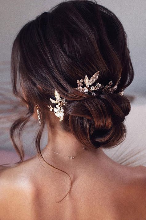 wedding hairstyles by tonyastylist elegant textured low bun with gold accessorie on brown hair tonyastylist Hairdo Engagement, Updo Inspiration, Sanggul Modern, Wedding Hairstyles Bride, Bridal Hair Updo, Medium Long Hair, Wedding Hair Inspiration, 짧은 머리, Wedding Hairstyles Updo