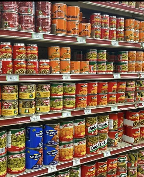 Red orange blue green canned food on Mexican grocery store aisle Growing Up Mexican Aesthetic, Mexican Vintage Aesthetic, Mexican Childhood Aesthetic, Mexican Childhood, Chicano Aesthetic, Flea Market Aesthetic, Mexican Store, Early 200s, Mexican Aesthetic