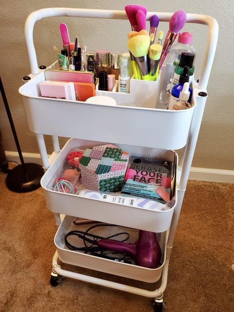 A three-tier storage cart that can hold anything that needs sorting, from beauty products to craft supplies. Trolley Cart Organization, Make Up Storage Cart, Bathroom Rolling Cart Storage, Organisation, Organizing Beauty Products Bedroom, 3 Tier Trolley Storage Ideas, Beauty Storage Bedroom, Makeup Cart Organizing, Beauty Supplies Organization