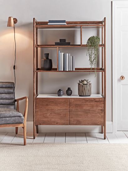 Best Living Room Layout, Oak Shelving Unit, Shelves Bookshelves, White Washed Floors, Living Room Layout, Oak Shelves, Brass Wall Light, Bookcase Shelves, Shelf Unit