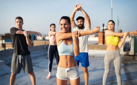 Group of young happy people friends exercising outdoors at sunset by nd3000. Group of happy fit young people friends training outdoors at sunrise #Affiliate #people, #friends, #exercising, #Group Fitness Drinks, Workout Photoshoot, Love Handle Workout, Yoga Barre, Leg Curl, Thigh Muscles, Fitness Design, Fitness Photography, Ancient Japanese