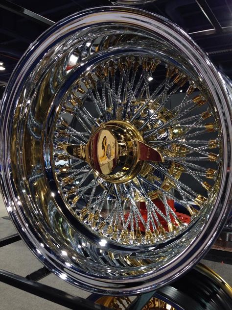 13x7 Reverse 72 Diamond Cut Spokes Cross Laced US Wire Wheel with Gold Nipples, Gold Hub and Gold 2 Bar Smooth Knock Off. Gold Rims Wheels, Custom Wheels Cars, Truck Rims, Wire Wheels, Color Correcting Concealer, Makeup Tip, Rims And Tires, Rims For Cars, How To Apply Foundation
