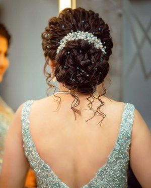 Curly Hairstyles Indian Wedding Bun, Bun Hairstyle With Flower, Bride Juda Hairstyle, Curls Bun Hairstyles, Bun With Flowers Hairstyle, Hairbuns Hairstyles Indian, Bridal Hair Buns With Flowers, Juda Hairstyle Buns, Floral Bun Hairstyle