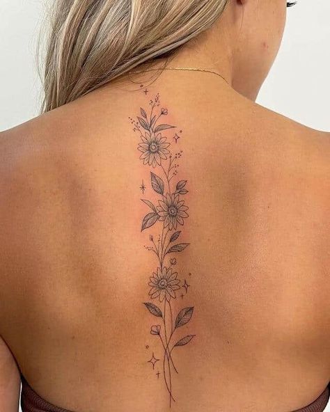 20 Unique And Meaningful Back Tattoos For Women Meaningful Back Tattoos, Back Tattoos For Women, Feminine Back Tattoos, Flower Spine Tattoos, Floral Back Tattoos, Basic Tattoos, Tattoos For Women Flowers, Petite Tattoos, Spine Tattoos For Women