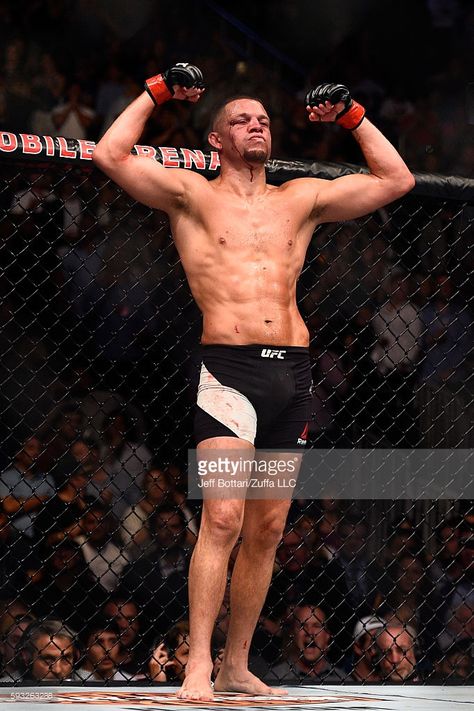 Nate Diaz gestures across the Octagon in his corner towards Conor McGregor of Ireland in their welterweight bout during the UFC 202 event at T-Mobile Arena on August 20, 2016 in Las Vegas, Nevada. Nick And Nate Diaz, Ufc Fighters Men, Nate Diaz Ufc, Diaz Ufc, 남성 근육, Feet Drawing, Mma Workout, Ufc Boxing, Nate Diaz