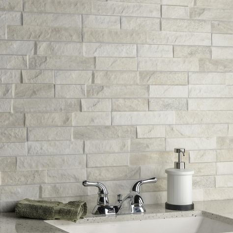 Through the realistic replication of natural stone, our Ordino White Porcelain Subway Wall Tile transforms any space into a functional and stylish extension of nature. Textured Backsplash Kitchen, Textured Subway Tile Backsplash, Stone Tile Backsplash Kitchen, White Stone Backsplash, Stacked Stone Backsplash, Textured Subway Tile, Natural Stone Backsplash, Stone Tile Backsplash, Stone Backsplash Kitchen