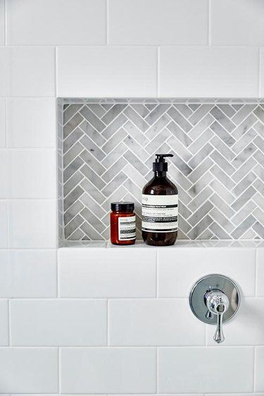 White Tiled Bathroom, Tile Shower Niche, Beautiful Tile Bathroom, Tiled Bathroom, Marble Herringbone, Small Bathroom Tiles, Subway Tiles Bathroom, Luxury Tile, Tiled Shower