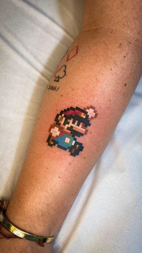 30 Epic Video Game Tattoo Ideas for Hardcore Gamers Super Mario Ghost Tattoo, Mario Galaxy Tattoo, Mario Tatoos, Super Mario Tattoo Design, Toad Tattoo Mario, Mario Tattoo Small, Super Mario Tattoo Ideas, Super Mario Tattoos, Nintendo Tattoo Ideas