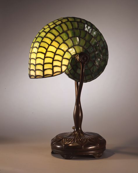 Louis Comfort Tiffany, Reading lamp, form of a Nautilus, after 1899 Figurine, Louis Tiffany, Art Nouveau Lamps, Shell Lamp, Tiffany Studios, Tiffany Art, Tiffany Lighting, Mouse House, Louis Comfort Tiffany