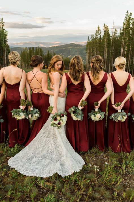 Love the different style of maroon bridesmaids dresses this group of women wore. They carried bridesmaid bouquets with white, pink, and maroon flowers. To see more of this TenMile Station wedding in Breckenridge check out the blog! Mismatched Bridesmaid Dresses Fall Colors, Maroon Dress Bridesmaid, Maroon And Pink Rustic Wedding, Red Burgundy Bridesmaid Dresses, Braidmaids Dress Red, Same Color Different Style Bridesmaid Dresses, Bridesmaid Dresses Cranberry, Wine Red Bridesmaids Dresses, Marron Bridesmaid Dresses Long