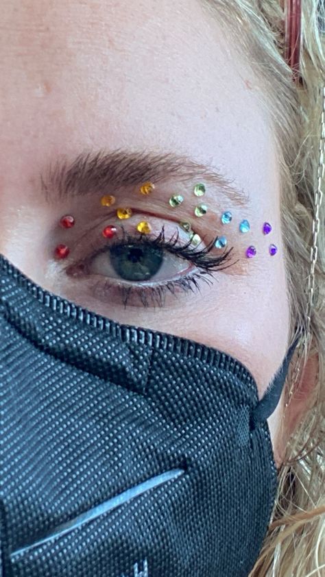 Pride Gems On Face, Festival Makeup Rainbow, Pride Face Gems, Pride Outfit Nonbinary, Pride Rhinestone Makeup, Makeup For Pride Festival, Rainbow Concert Outfit, Rainbow Gem Makeup, Pride Makeup Rhinestones