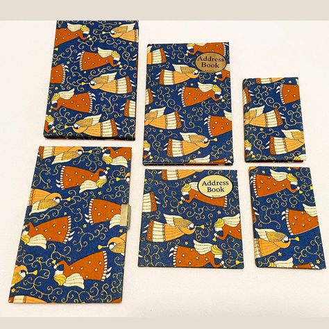 Set Of 6 Fabric & Padded Covered Books. Blue Background With Angel Designs. Included In 6 Pack Set Are: 1 Large Padded & Rule Lined Journal: Size 8.5 X 5.25 (Retail 7.95 Each)., 1 Small Rule Lined Journal Size: 5.5 X 3.25 (Retail 4.59 Each), 1 Large Locked Diary With Lock & Key Size: 8.5 X 5.25 (Retail 9.95), 1 Large Address Book Size 8.5 X 5.25 (Retail 8.50 Each), 1 Square Size Address Books Size: 5.5 X 5.5 (Retail 6.50 Each), And 1 Small Address Book Size: 5.5 X 3.25 (Retail 5.50 Each) A1 All Brand New. Locked Diary, Angel Fabric, Coca Cola Mini, Chanel Bag Classic, Diary With Lock, Covered Books, Address Books, Parrot Head, Twilight Book